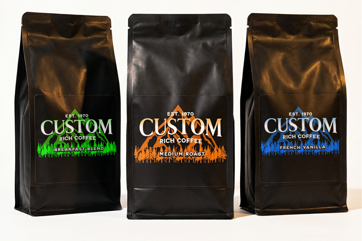 Three black coffee bags with Personalized branding on a white background
